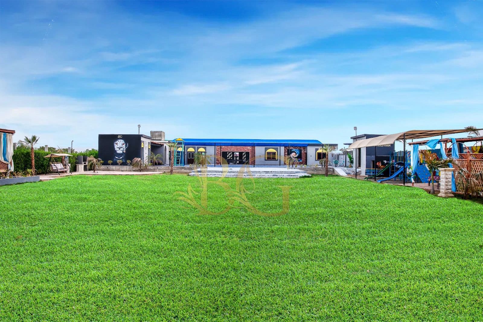 Panoramic daylight view of the main estate lawn & kids play area